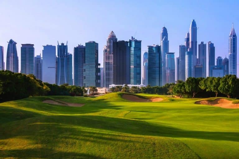 Address Montgomerie Golf Club - City view as backdrop